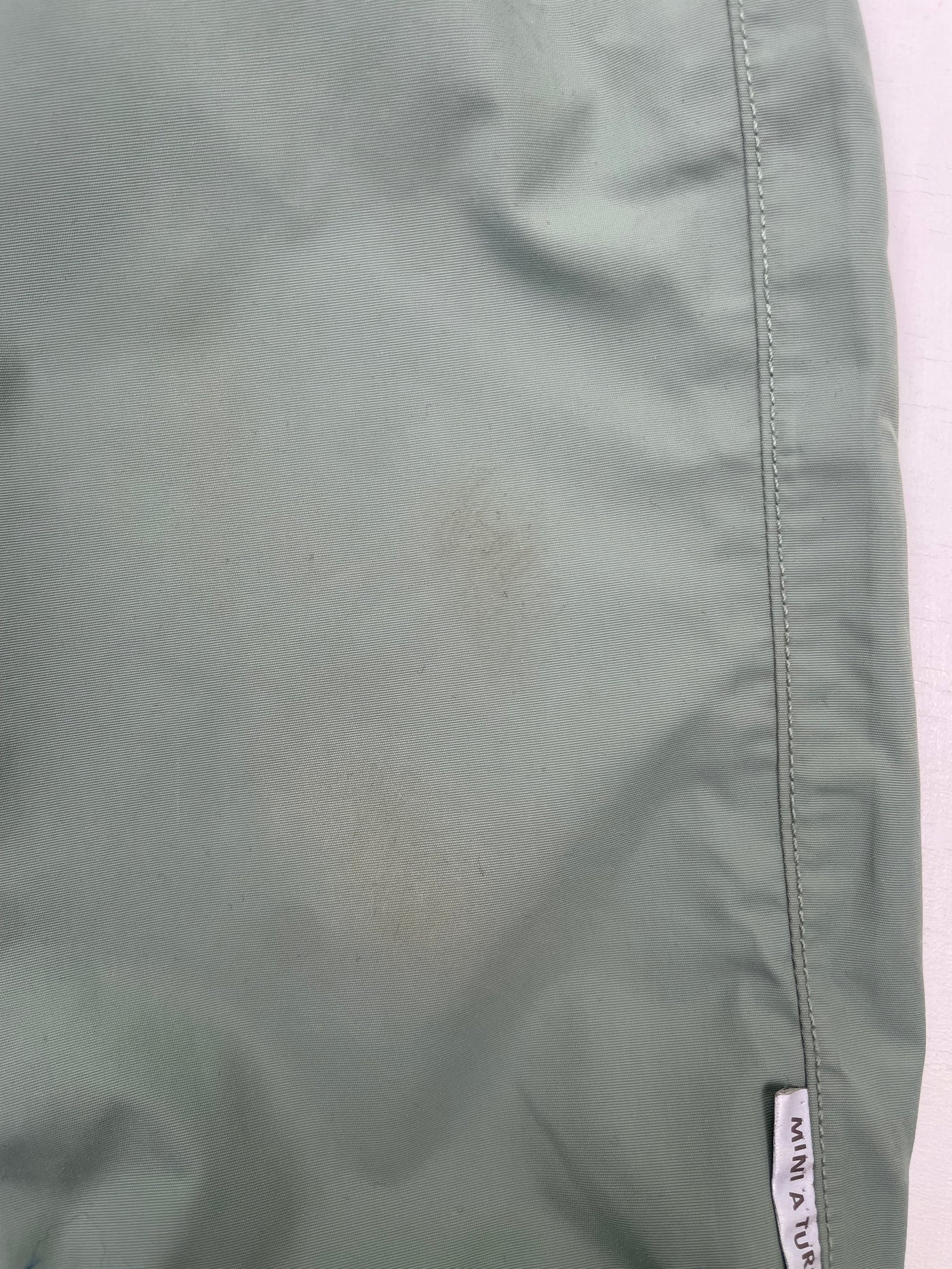 Mini A Ture midseason shell pants, tea green | 92cm