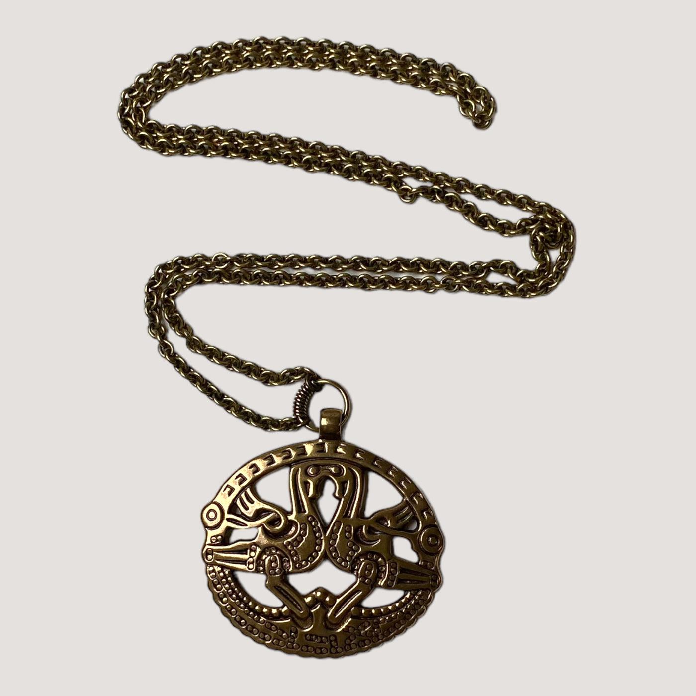 Kalevala Koru Kuhmoisten kukot necklace, bronze