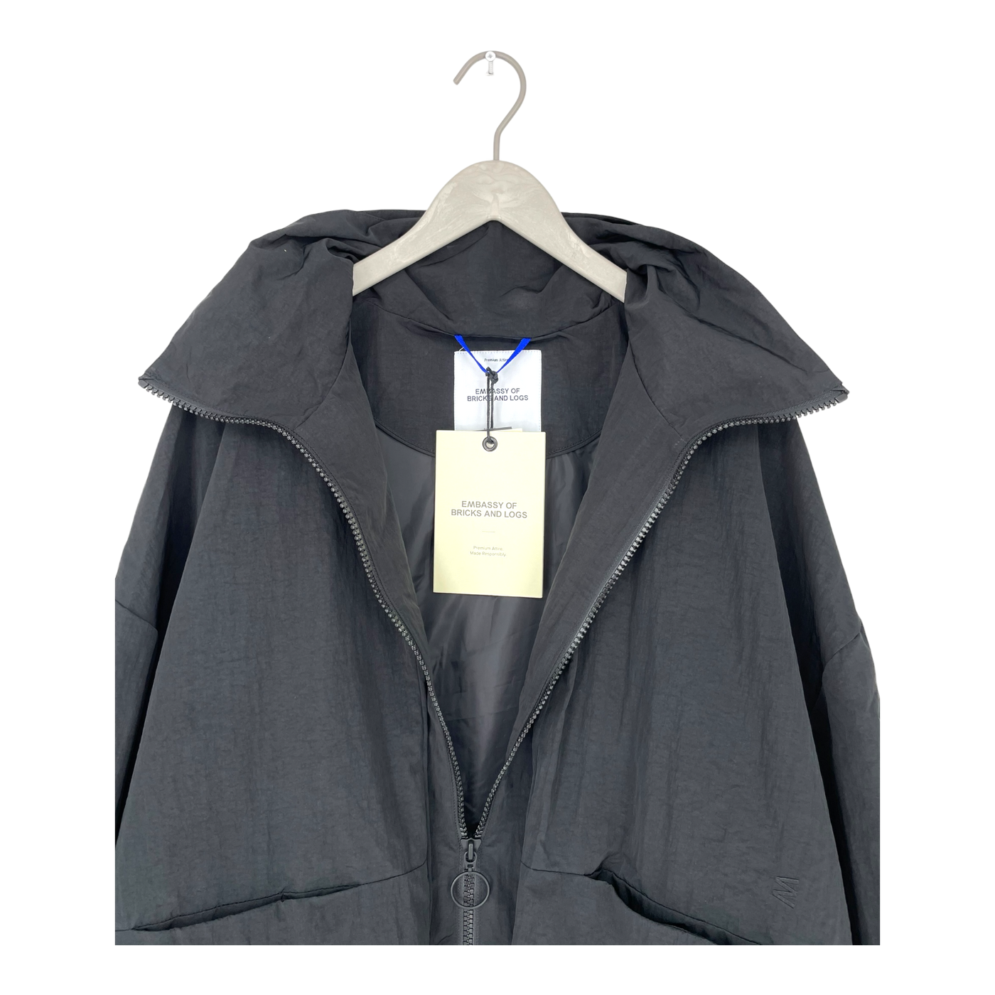 Embassy of Bricks and Logs vista raincoat, black | unisex S