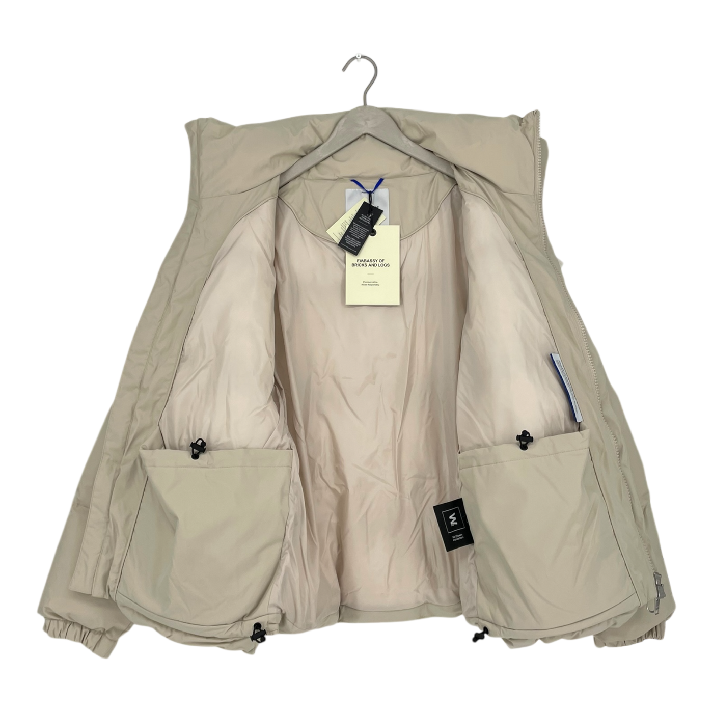 Embassy of Bricks and Logs Novelty puffer jacket, sand | unisex L